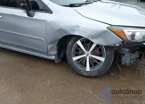 2021 Subaru Impreza Premium from USA, damaged, VIN 4S3GKAV62M3606531